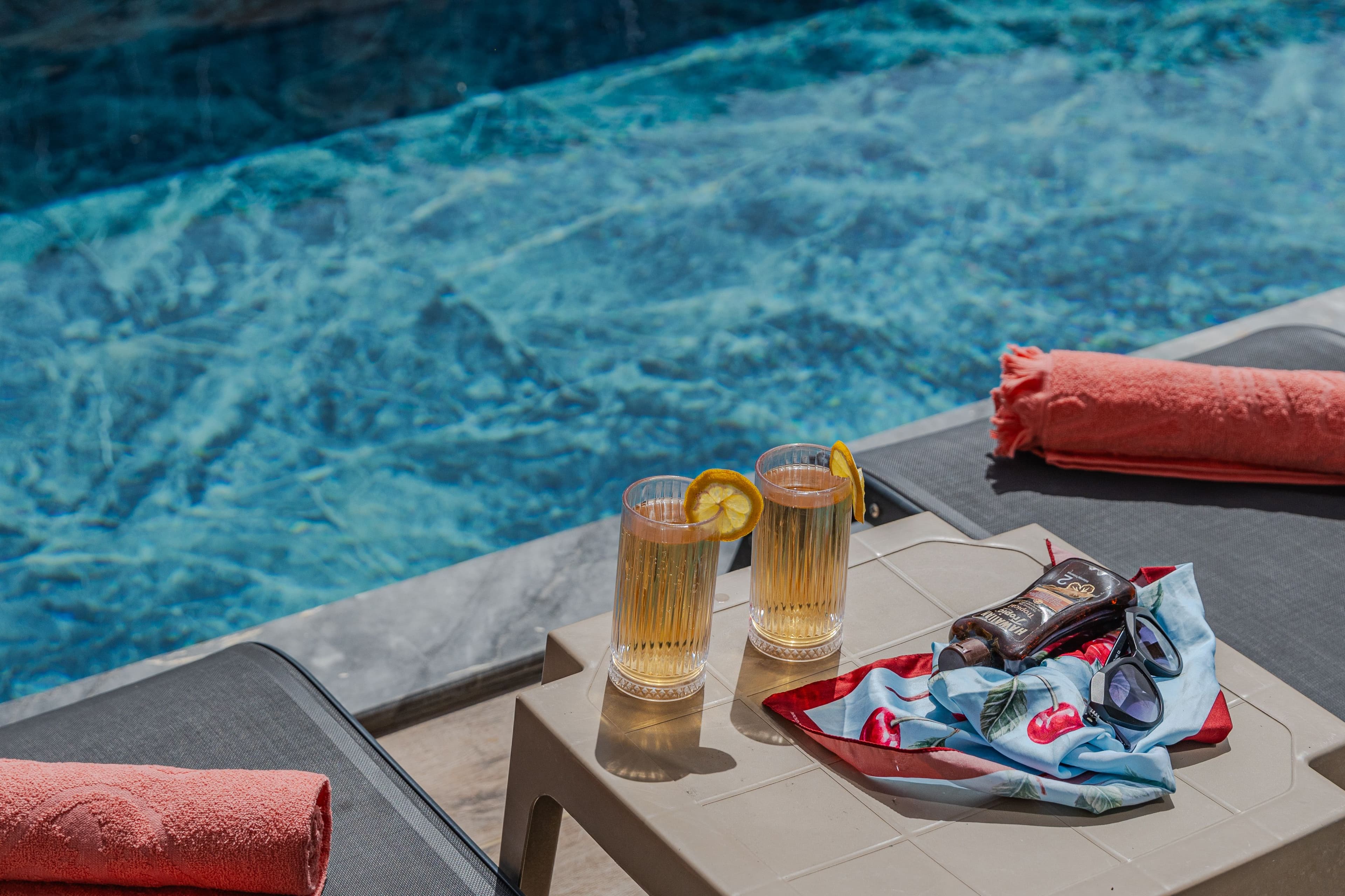 Essential travel gear packed on a boat deck for a Red Sea trip